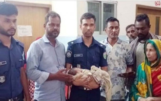 কবরস্থান থেকে নবজাতক উদ্ধার