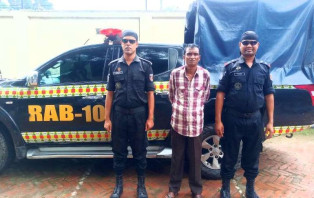 ফরিদপুরে যাবজ্জীবন সাজাপ্রাপ্ত পলাতক আসামীকে গ্রেপ্তার করেছে র‌্যাব
