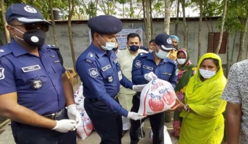 শিবচরে বেদে সম্প্রদায়ের পাশে জেলা পুলিশ